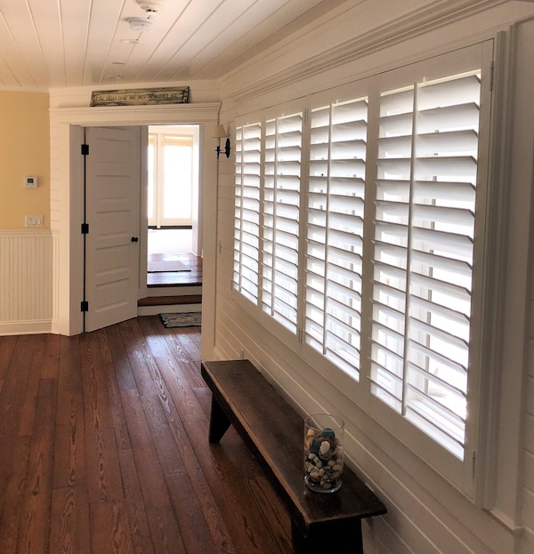 Plantation shutters in an entry